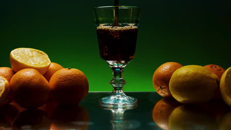 pouring drink with citrus fruits