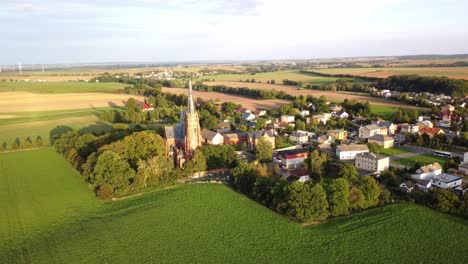 opava district, czech republic - the church of jana krtitele in sudice village - orbit drone shot