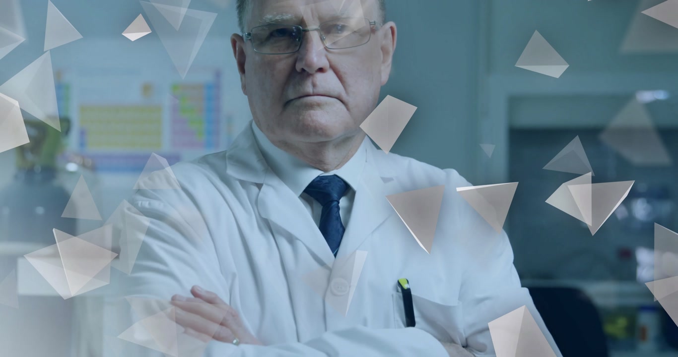 Senior male scientist standing arms crossed in lab, displaying floating digital triangular overlays