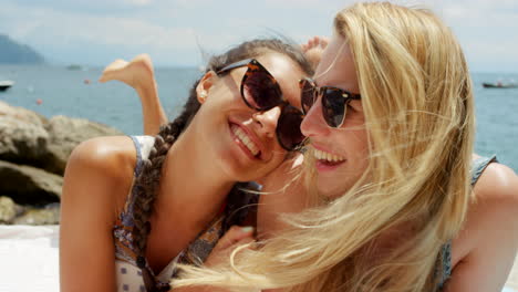 happy friends at the beach