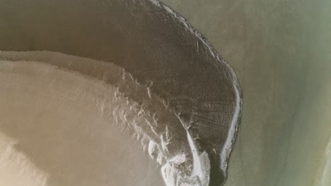 aerial view of salt flats with unique patterns