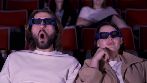 couple watching a movie in 3d