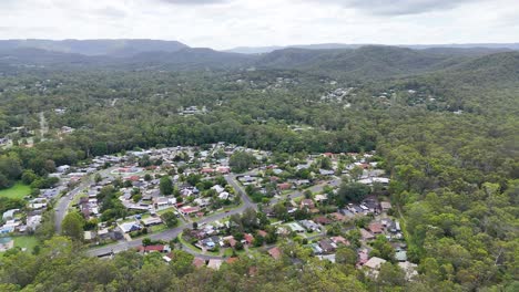 aerial footage of houses and greenery in nerang