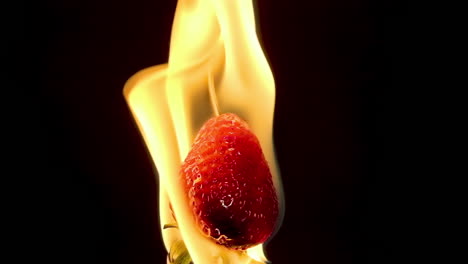 strawberry burning in flames loop slow motion