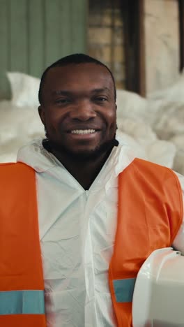 portrait of a happy worker in protective gear