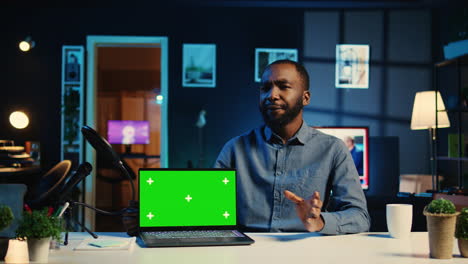 influencer unboxes green screen notebook