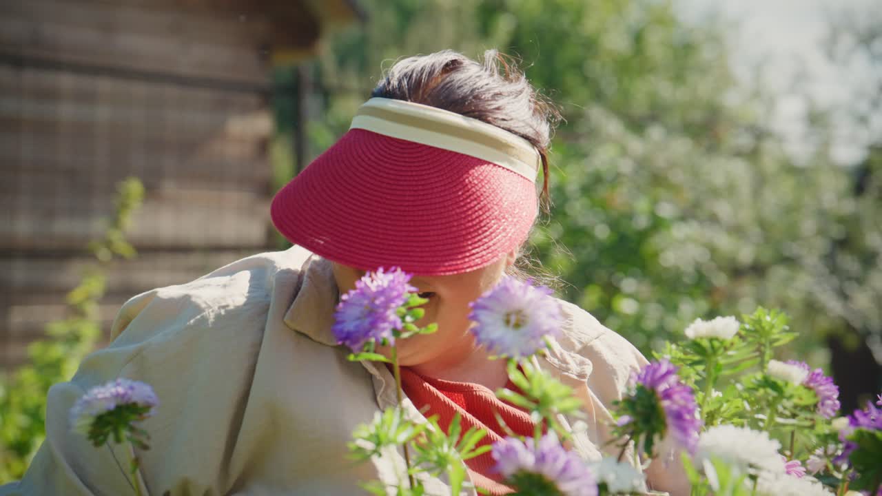 A Gardener Enjoying a Colorful Flower Garden While Nurturing Blooms on a Sunny Day, Celebrating Nature's Beauty and the Joy of Gardening in Vibrant Colors