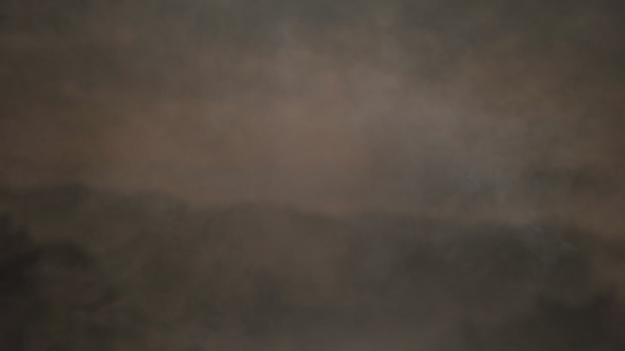 검은 바탕 위에서 움직이는 연기의 애니메이션