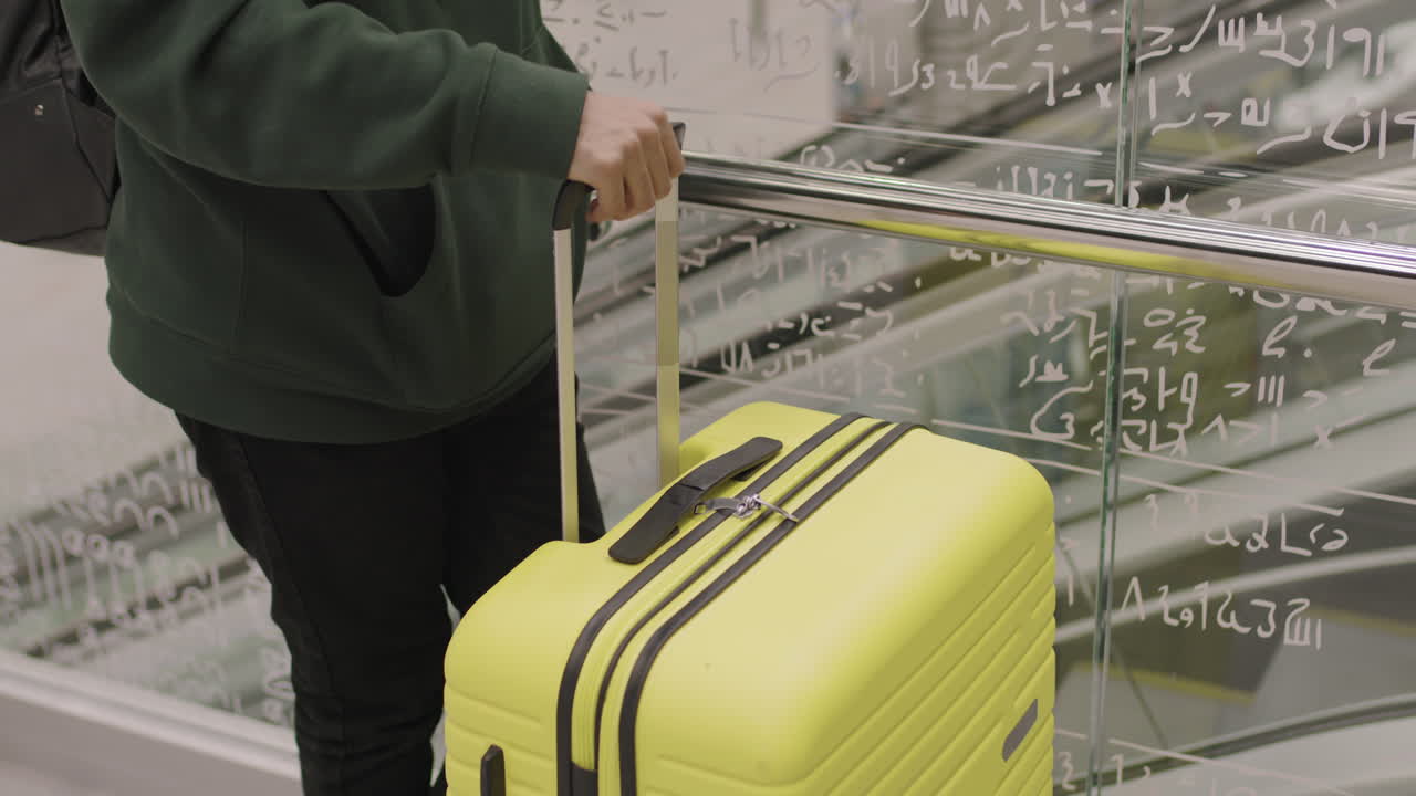 Unrecognizable Man With Suitcase