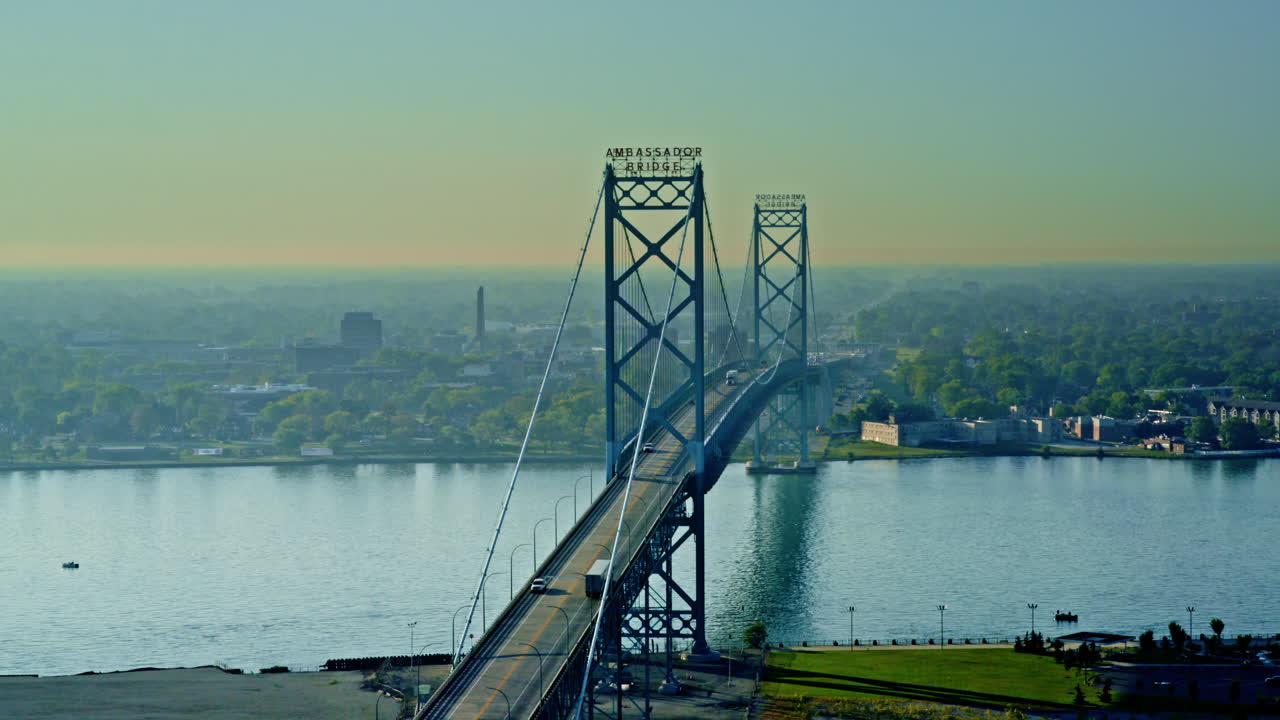 Aerial drone shot revealing the Ambassador Bridge that connects the USA and Canada