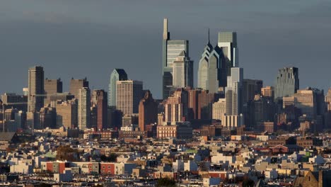 downtown philadelphia skyline with housing in foreground