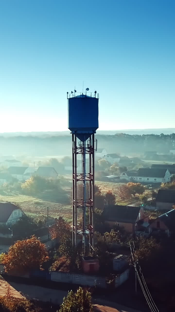 Village houses in traditional style. Aerial view of beautiful village in countryside Vertical video