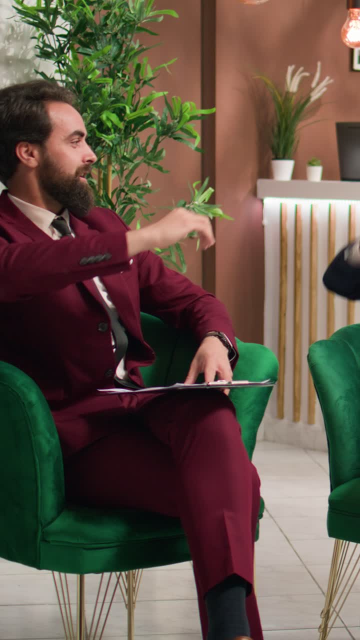 Vertical Video Collaborators doing highfive in lobby