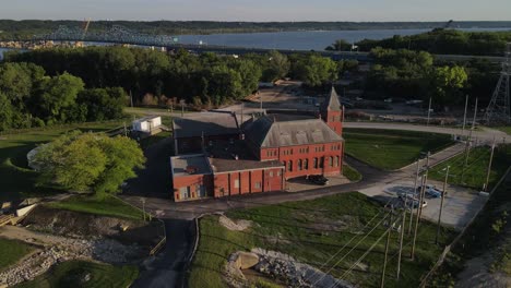 aerial floating towards the peoria, illinois water treatment plant sitting on the banks of the illinois river