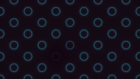 Blue-neon-geometric-circles-in-rows-on-black-gradient