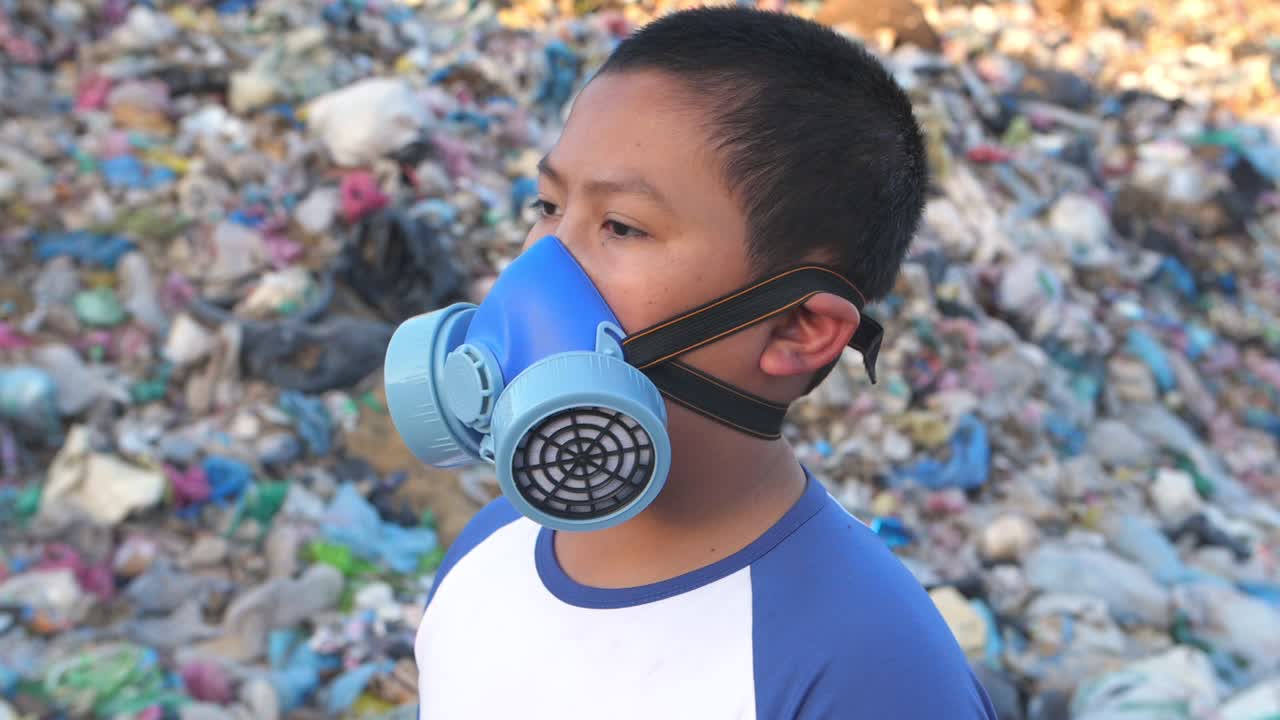 Asian Boy Wearing Pollution Mask Walking In Environmental Pollution, Slow Motion