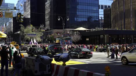 the area around madison square garden is filled with trump supporters, all energized by the bright sunlight and vibrant atmosphere