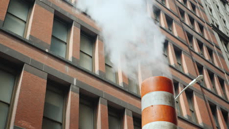 Pipe-With-Excess-Steam-From-The-Steam-System-Of-New-York-Bright-Orange-Striped---One-Of-The-Symbols