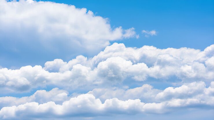 Blue sky with fluffy clouds