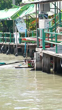 a boat travels along a bustling canal