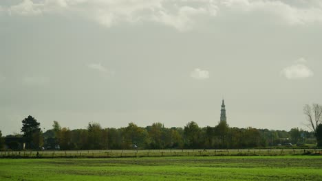 rural area near the city of middelburg with a view of the big tower lange jan