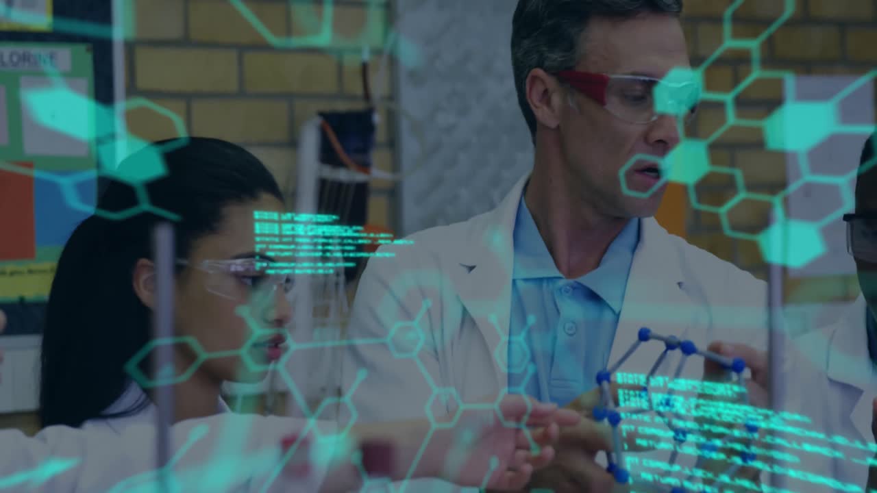 un maestro de escuela ayudando a los estudiantes a construir un modelo de molécula en un laboratorio