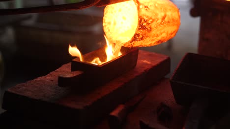 close-up of pouring molten metal