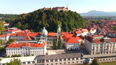 stunning drone footage of ljubljana, slovenia, showcasing the charming old town, the medieval castle, and the vibrant city center with its picturesque streets and unique architecture