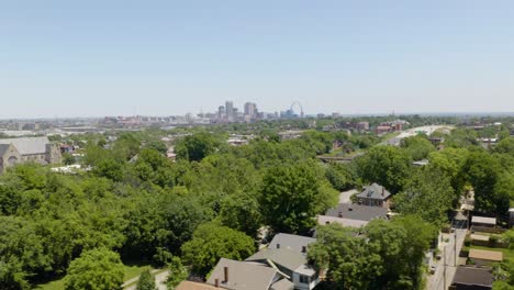 Aerial-Truck-Left,-Saint-Louis-Skyline-in-Background-on-Beautiful-Summer-Day