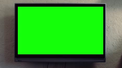 wall-mounted tv with green screen