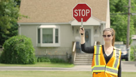 Panning-across-crossing-guard-on-street