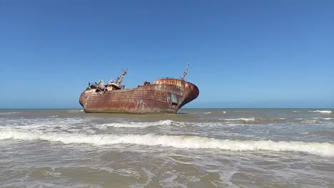 abandoned fishing boat after it ran aground and crashed on the shores