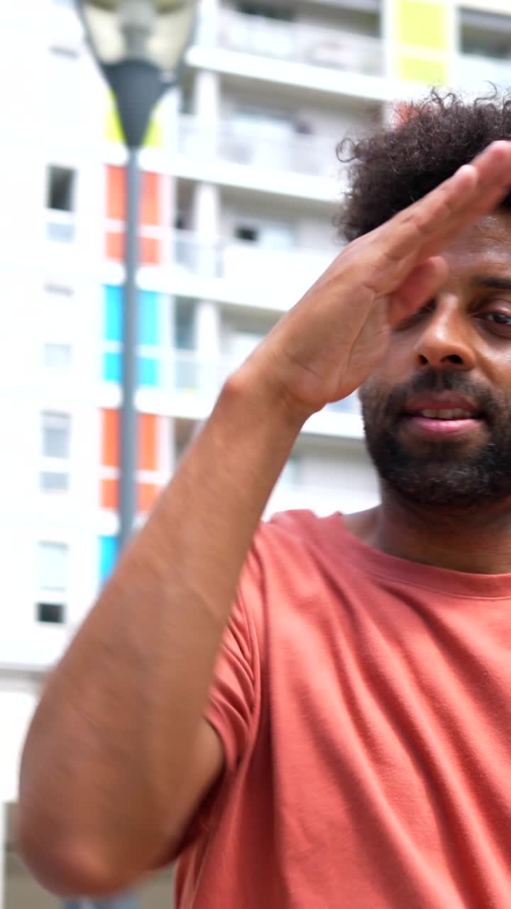 People near buildings and trees outdoors during daytime