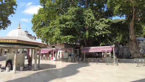 historical ottoman square with fountain and trees