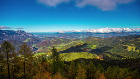 time-lapse of clouds moving over the fall colored mountains in the berchtesgaden alps of germany