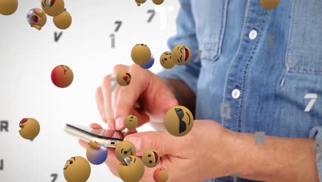 animación de iconos emoji flotantes y sección media de un hombre usando un teléfono inteligente