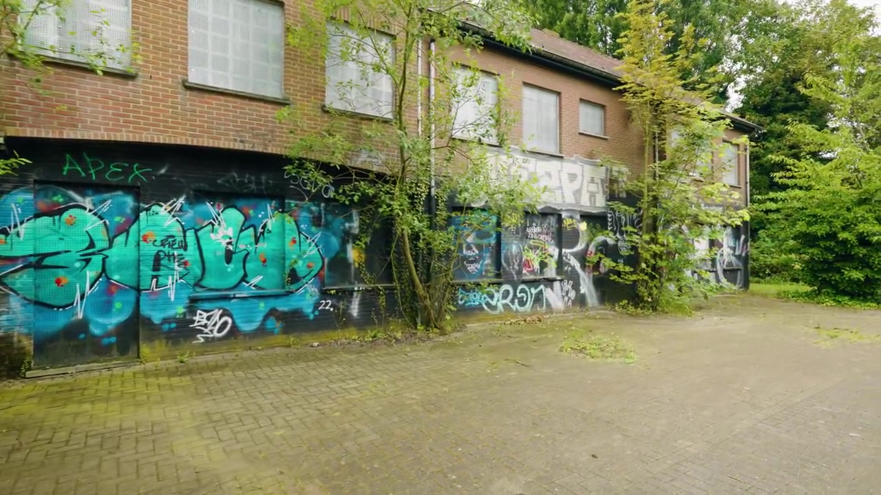 POV walk through abandoned ghost town Doel with graffiti, deserted buildings and silent streets - Antwerpen, Belgium