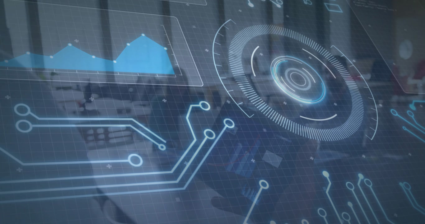 HUD overlay activating over blurred desks staff typing charts and lines syncing showing tech data