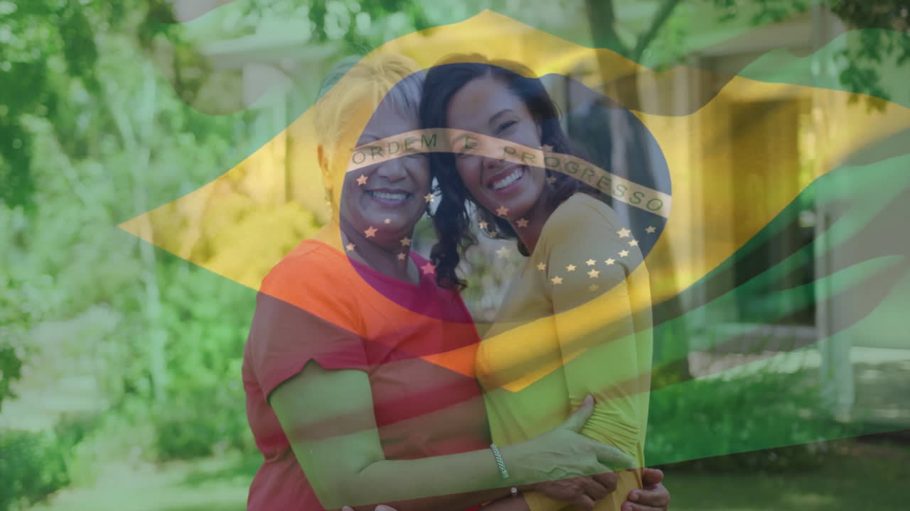 Animazione della bandiera del Brasile su donna afroamericana anziana con la figlia adulta