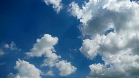 clouds are moving in the blue sky. time lapse