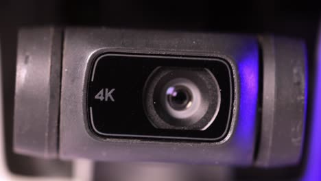 4k camera with gimbal embedded in a drone, very close up view, macro shot