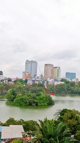 panoramic view of hanoi\'s urban landscape and lake