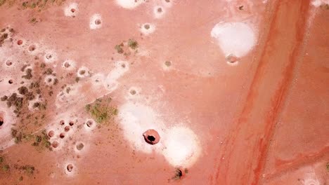 Aerial-drone-shot-of-opal-mines-and-mining-tailings-in-the-desert-outback-of-Coober-Pedy-Australia-2