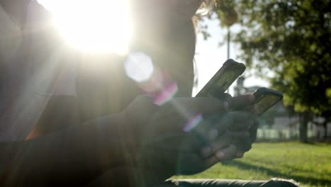 cropped shot of young people using smartphones