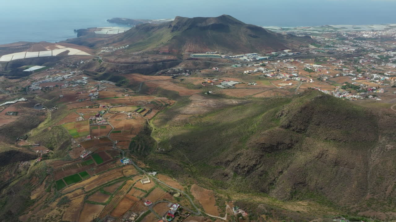 Aerial views of mountains and coast on the island of Gran Canaria.
