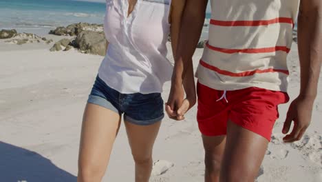 young couple by the sea