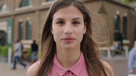 slow motion portrait of young beautiful pensive woman student looking serious staring thoughful at camera