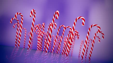 Hard-cane-shaped-candy-sticks-with-traditional-white-and-red-stripes,-flavored-with-peppermint-is-very-popular-sweet-during-the-Christmas-holidays.-Animation-of-candies-standing-in-array.-Loopable.-HD