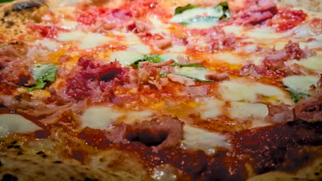 close up of neapolitan pizza in traditional pizzeria restaurant in naples italy