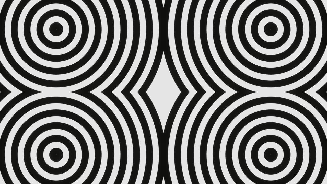 검은색과 색의 원 패턴이 끝없는 루프로 되어 있습니다.
